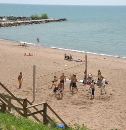 People playing volleyball on the beach